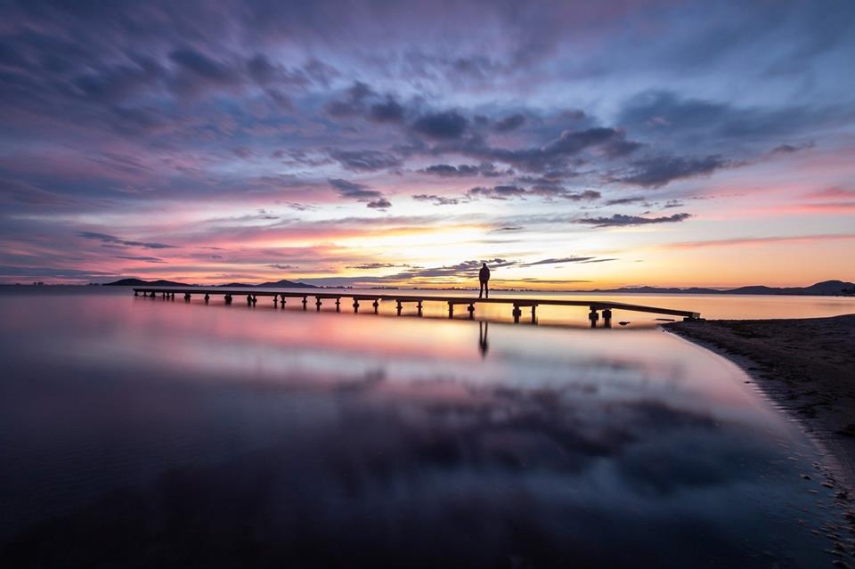 Man On Pier Under Purple Sunset jigsaw puzzle