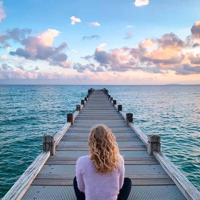Woman On Bridge Looking At The Ocean jigsaw puzzle