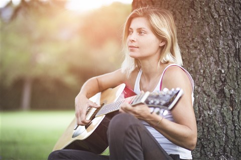 Girl Playing Guitar jigsaw puzzle
