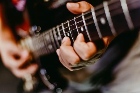 Playing Guitar jigsaw puzzle
