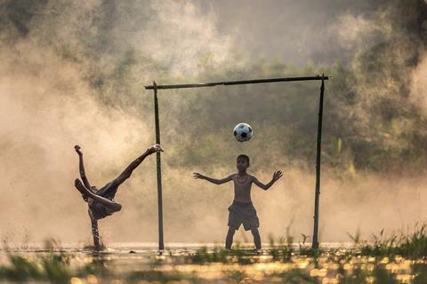 Children Playing Football jigsaw puzzle