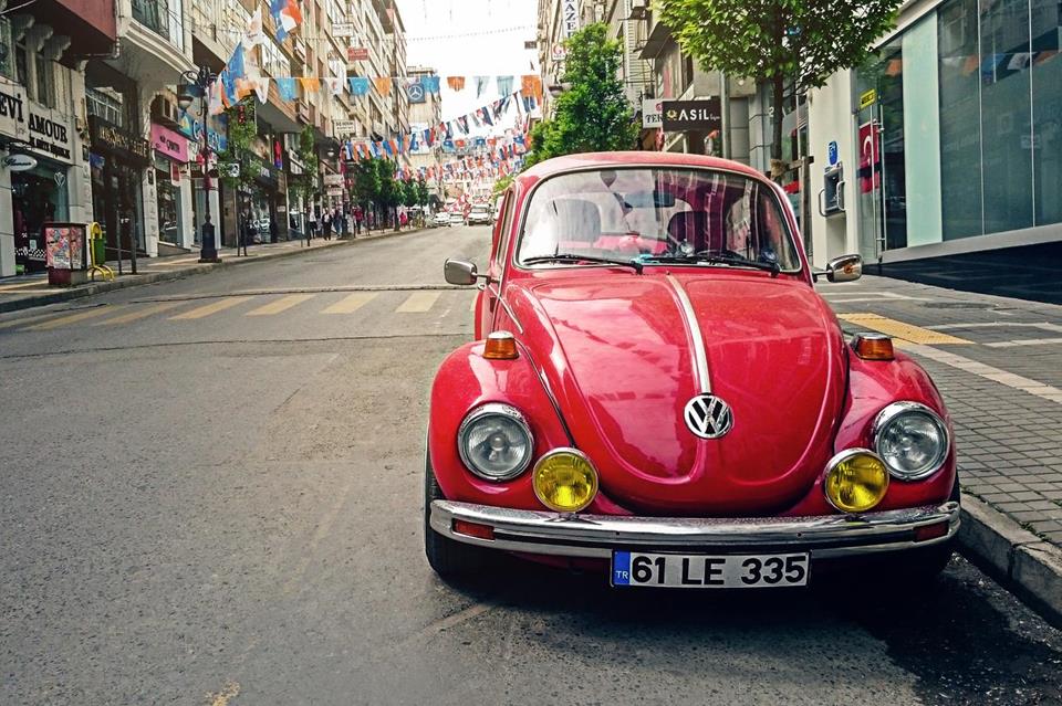 Red Volkswagen Beetle Parked At Road Side jigsaw puzzle