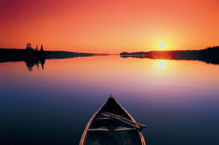 a sunset over a body of water jigsaw puzzle
