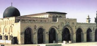 a large stone building with Al-Aqsa Mosque in the background jigsaw puzzle