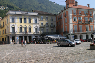 a group of people walking in front of a building jigsaw puzzle