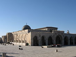 a large stone building with Al-Aqsa Mosque in the background jigsaw puzzle