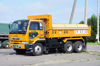 a truck is parked on the side of a road jigsaw puzzle