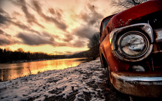 a car parked in front of a sunset jigsaw puzzle