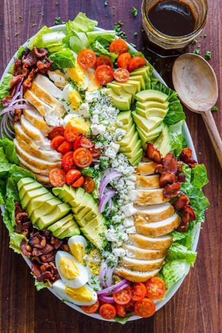 a bunch of food sitting on top of a wooden table jigsaw puzzle