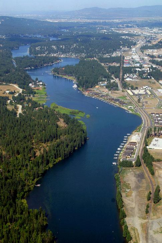 a view of a large body of water with a city in the background jigsaw puzzle