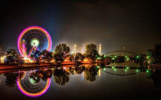a bridge lit up at night jigsaw puzzle
