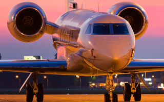 a large passenger jet sitting on top of a runway jigsaw puzzle