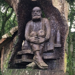 a person standing next to a tree jigsaw puzzle