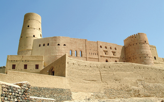 a castle on top of Bahla Fort jigsaw puzzle