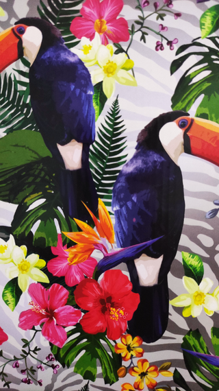 a colorful bird perched on a flower jigsaw puzzle