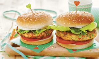 a sandwich sitting on top of a wooden table jigsaw puzzle
