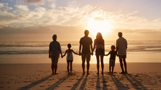 a group of people standing on a beach jigsaw puzzle
