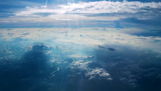 a view of an airplane flying in the sky jigsaw puzzle