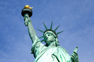 a person wearing a costume with Statue of Liberty in the background jigsaw puzzle