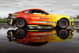 a racing car on a road jigsaw puzzle