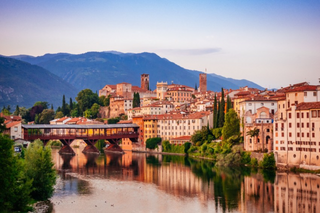 a train crossing a bridge over a body of water jigsaw puzzle