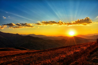 a sunset over a hill jigsaw puzzle