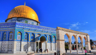 a large building with Dome of the Rock in the background jigsaw puzzle