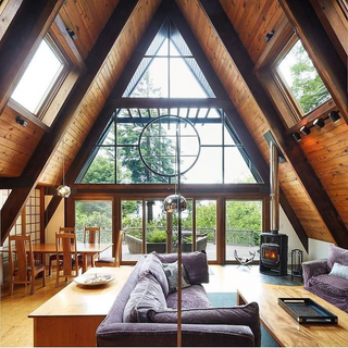 a living room filled with furniture and a large window jigsaw puzzle
