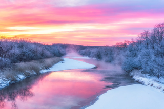 a sunset over the snow jigsaw puzzle