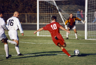 a group of young men playing a game of football jigsaw puzzle