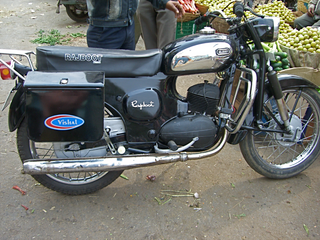 a motorcycle parked on the side of a road jigsaw puzzle